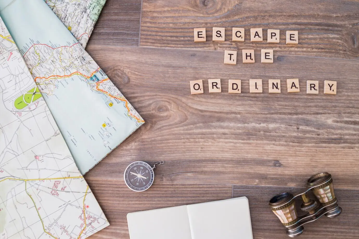 A composition of travel elements including letters.